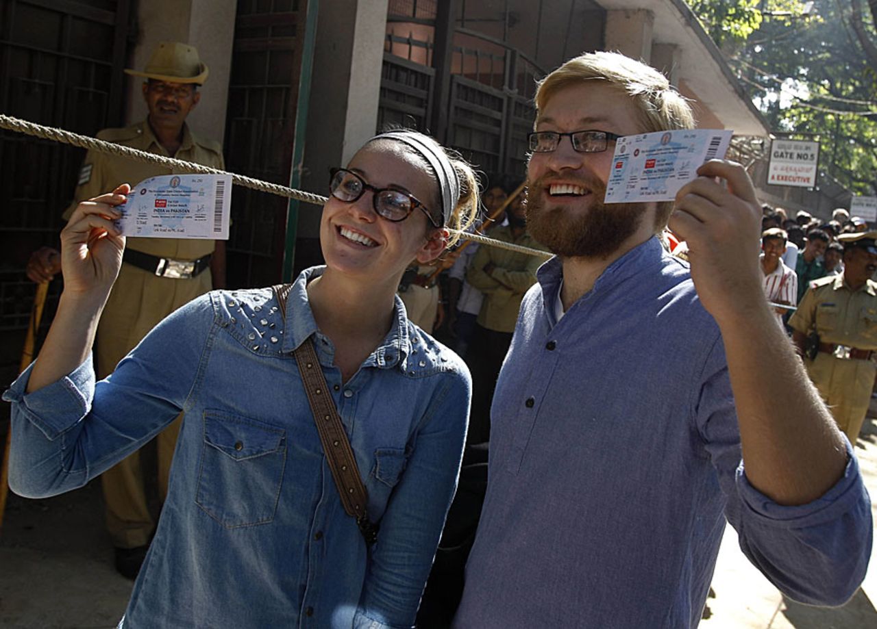 Fans in Bangalore show their tickets to the India-Pakistan T20 match, Bangalore, December 21, 2012
