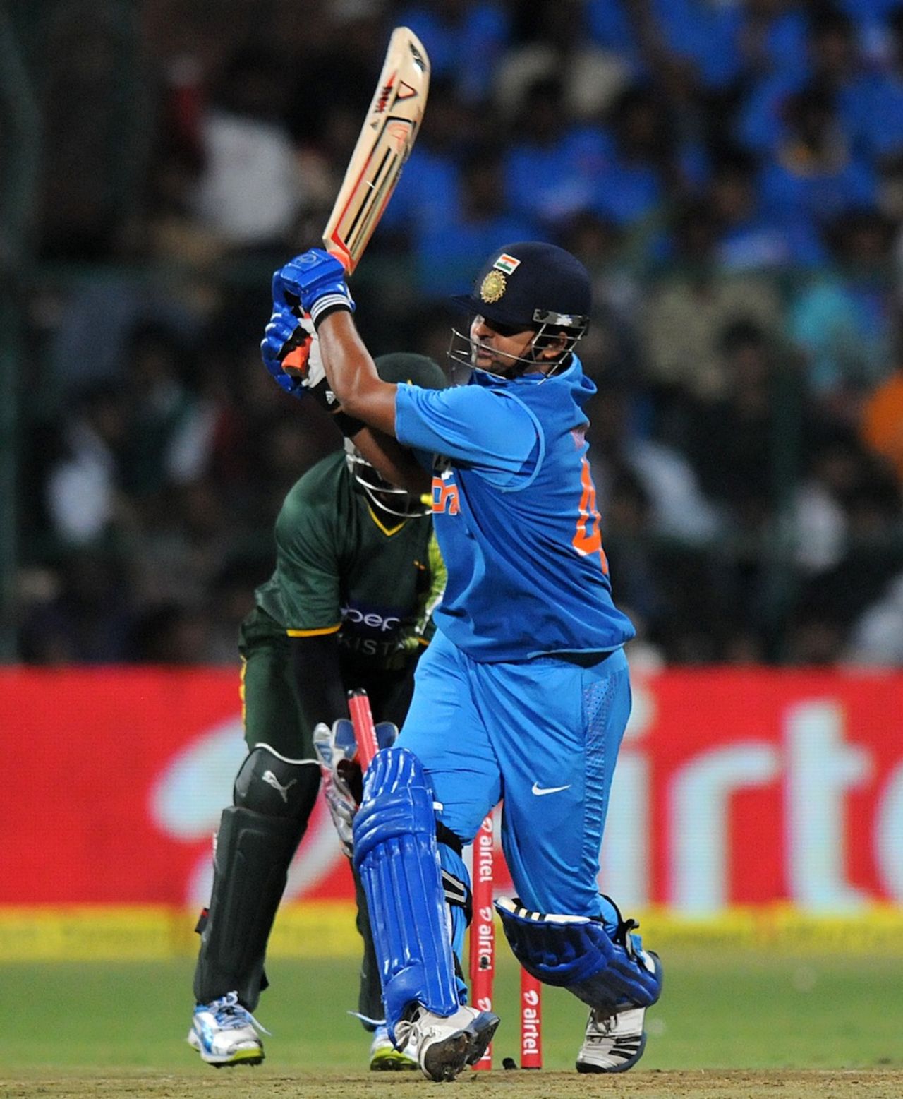 Suresh Raina misses a Saeed Ajmal delivery, India v Pakistan, 1st T20, Bangalore, December 25, 2012