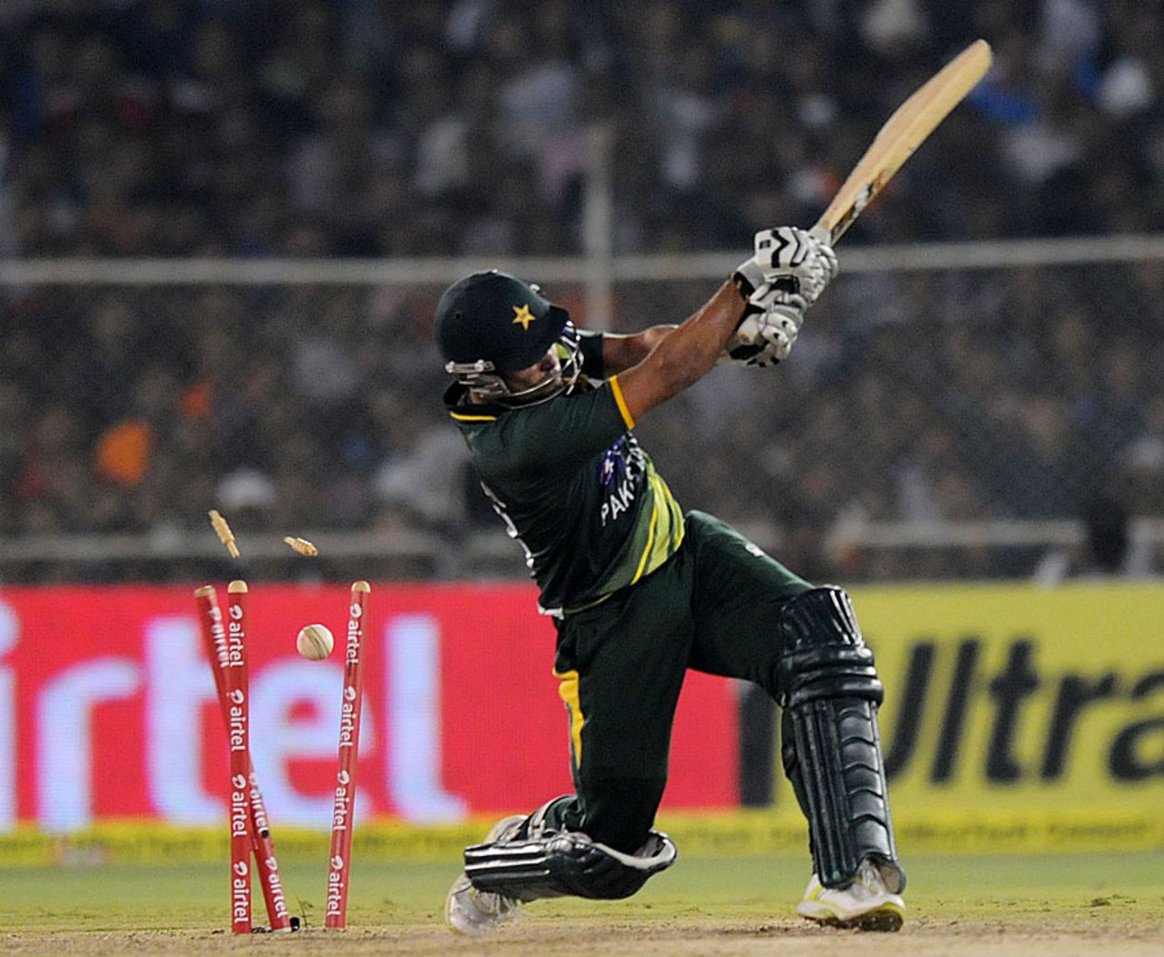 Umar Akmal misses a slower ball and is bowled, India v Pakistan, 2nd Twenty20, Ahmedabad, December 28, 2012