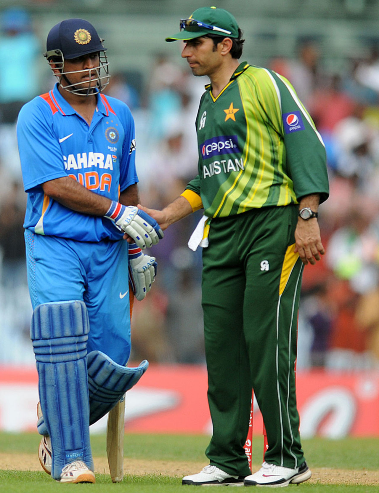 MS Dhoni is congratulated by Misbah-ul-Haq after his knock of 113, India v Pakistan, 1st ODI, Chennai, December 30, 2012