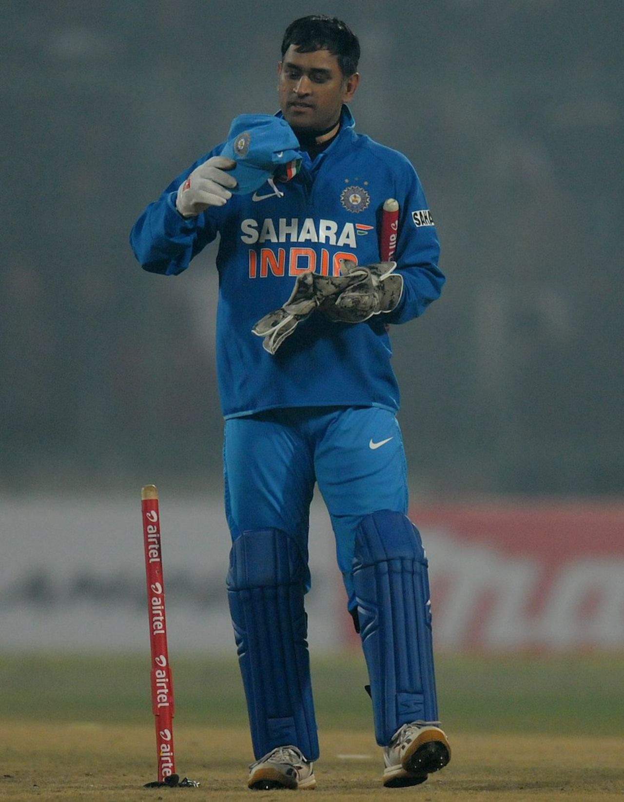 MS Dhoni leaves with a stump, India v Pakistan, 3rd ODI, Delhi, January 6, 2013