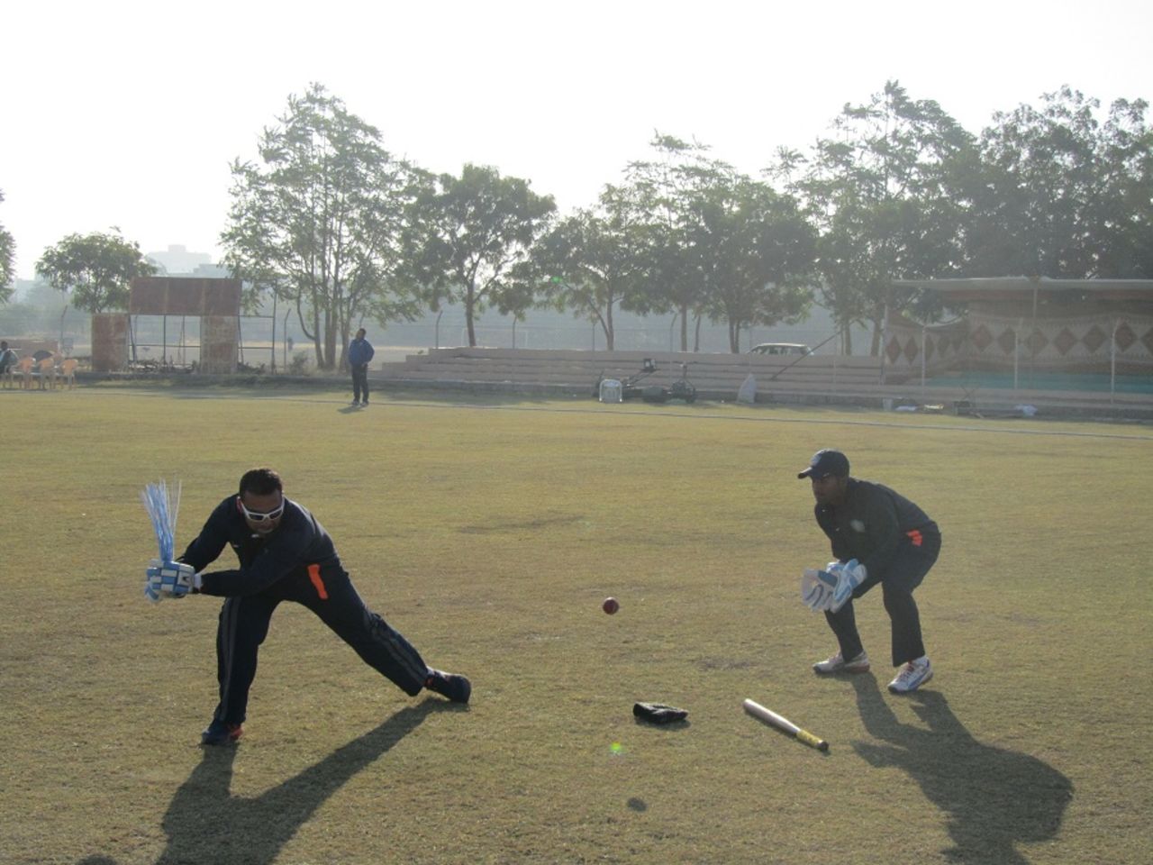 J Arunkumar, Karnataka's coach, gives close-in catching practice