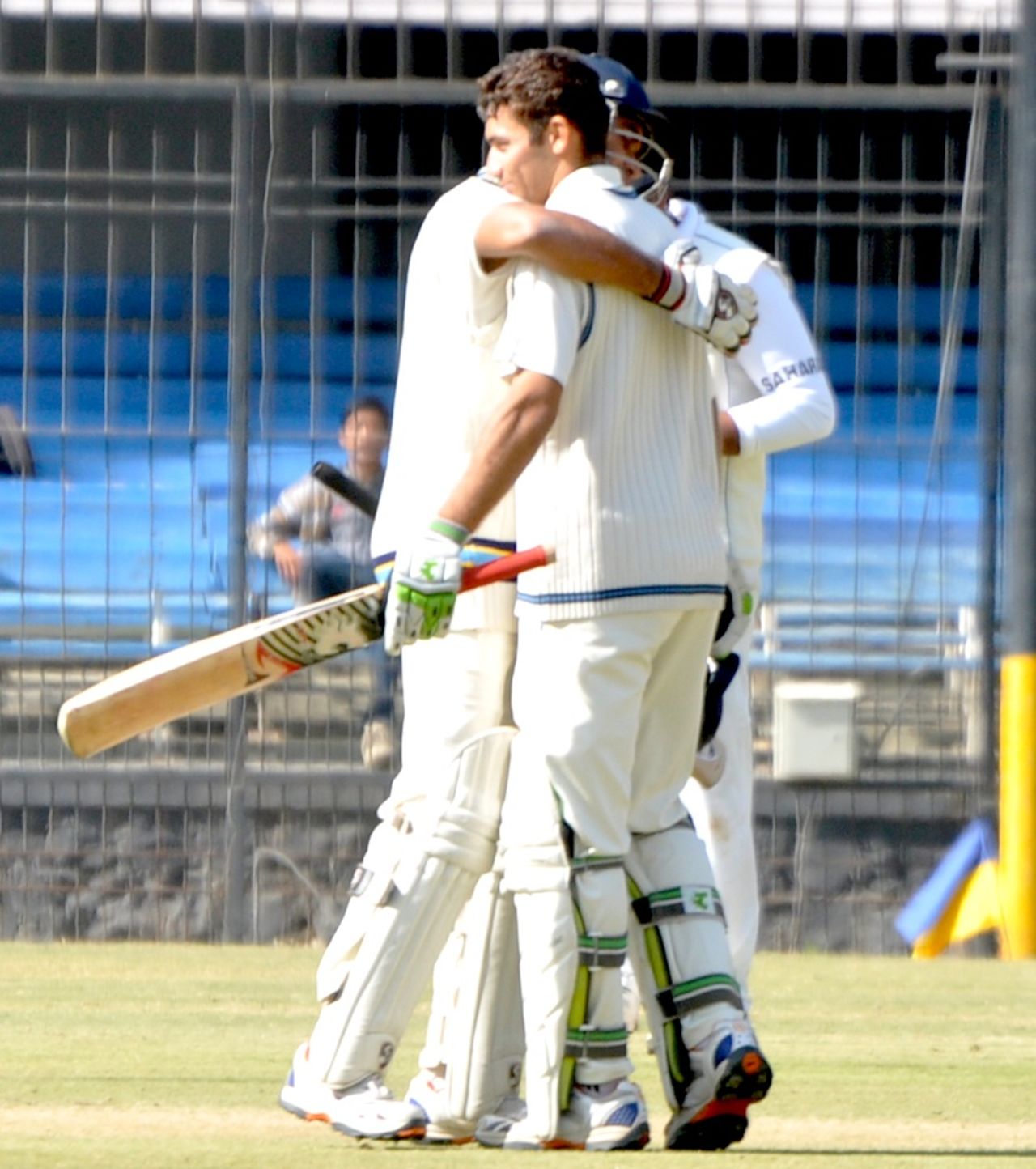Rajat Paliwal being congratulated after completing his hundred, Services v UP, Ranji Trophy Quarter-final, Indore, 2nd day, January 7, 2012