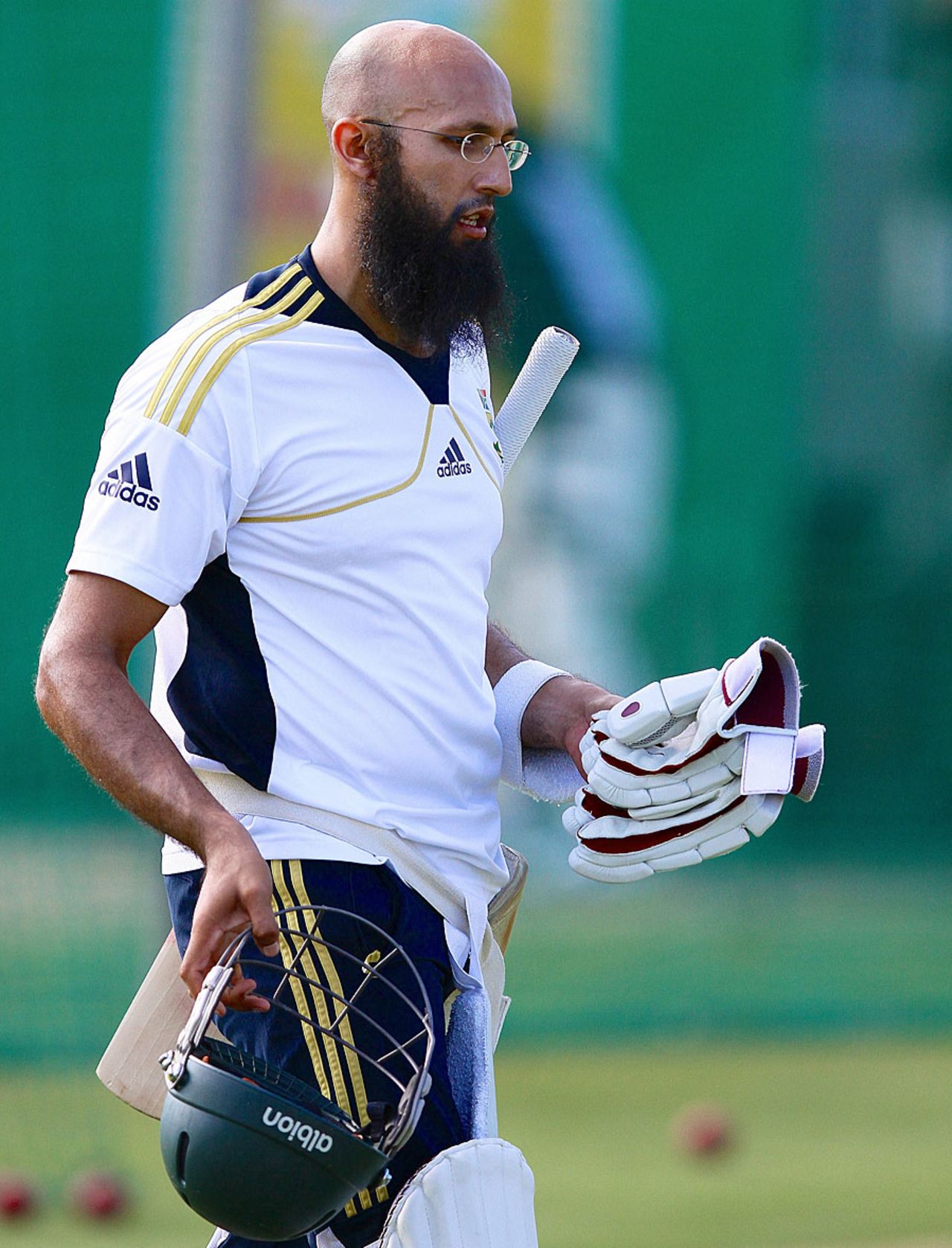 Hashim Amla goes out to bat at the nets, Port Elizabeth, January 8, 2013