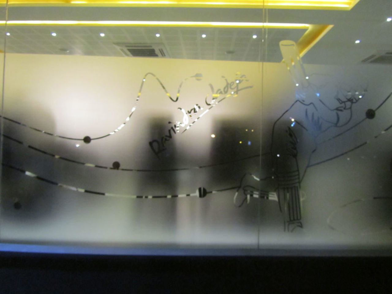 A glass window at Jaddu's Food Field, Ravindra Jadeja's restaurant in Rajkot