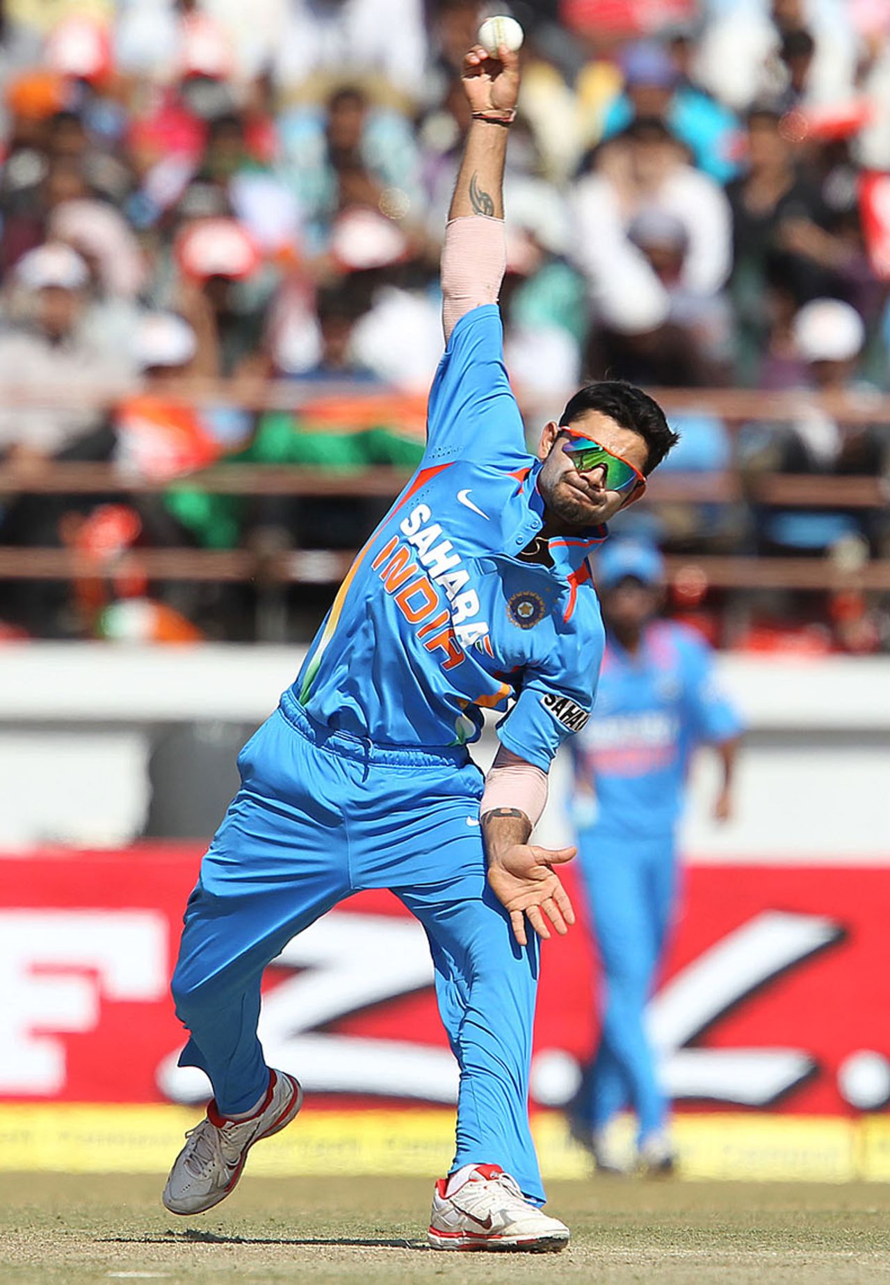 Virat Kohli bowls, India v England, 1st ODI, Rajkot, January 11, 2013