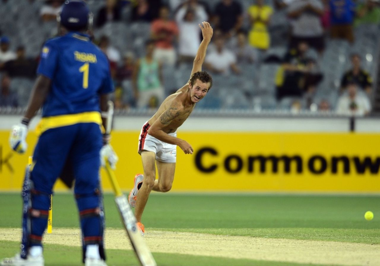 A pitch invader manages to bowl a ball on the cut strip, Australia v Sri Lanka, 1st ODI, Melbourne, January 11, 2013
