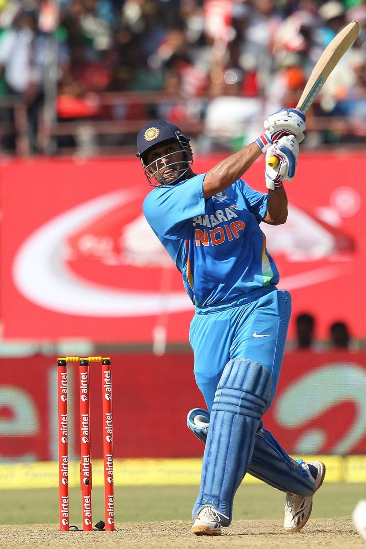 MS Dhoni sends one to the stands during his knock of 72, India v England, 2nd ODI, Kochi, January 15, 2013