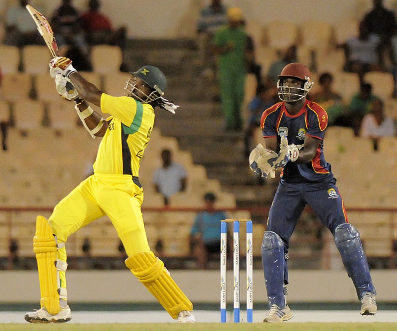 Chris Gayle goes over the top during his 85, Combined Campuses and Colleges v Jamaica, Caribbean T20, St Lucia, January 18, 2013 