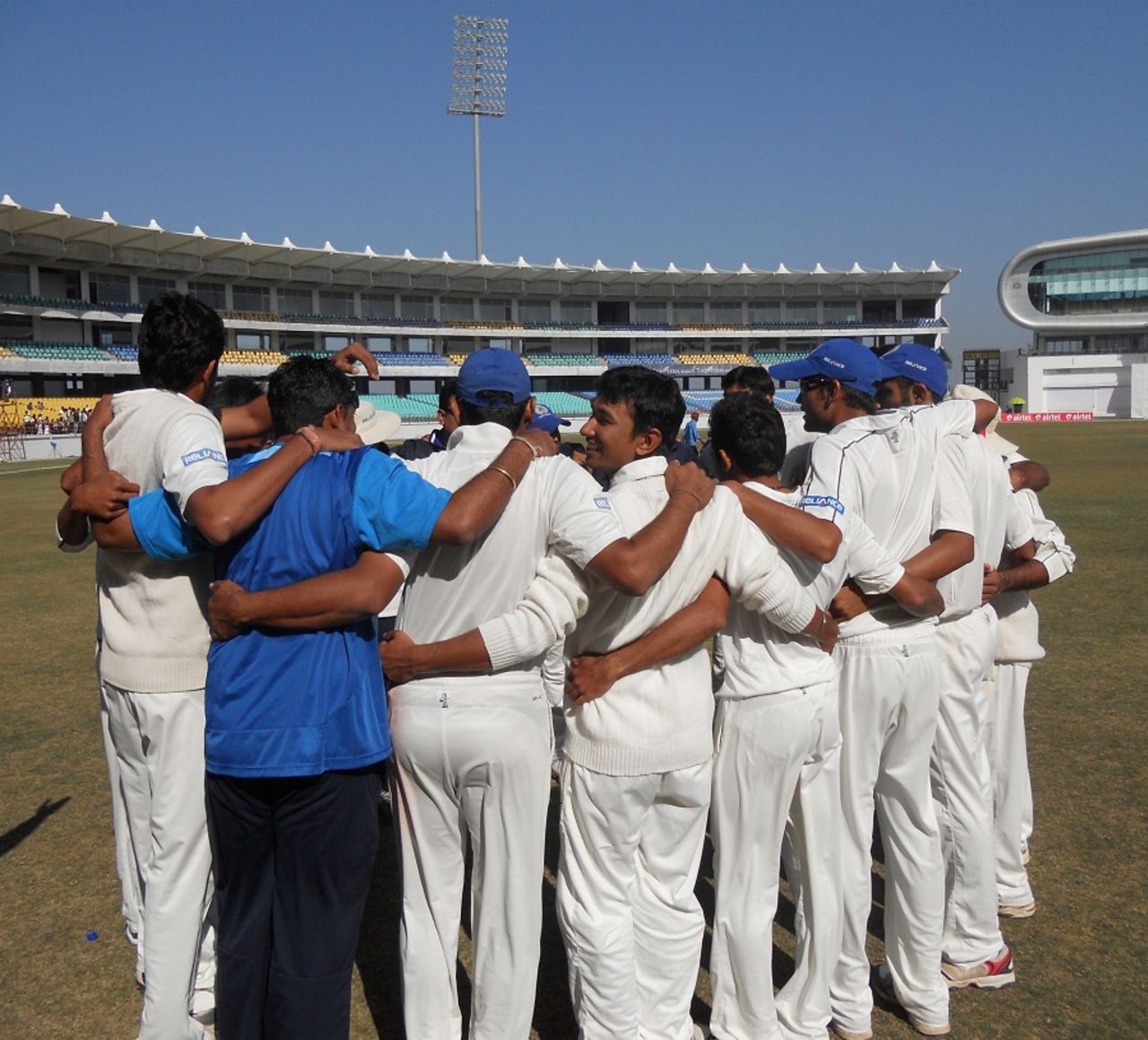 Saurashtra players get into a huddle after winning the semi-final, Saurashtra v Punjab, 1st semi-final, Ranji Trophy 2012-13, Rajkot, 5th day, January 20, 2013