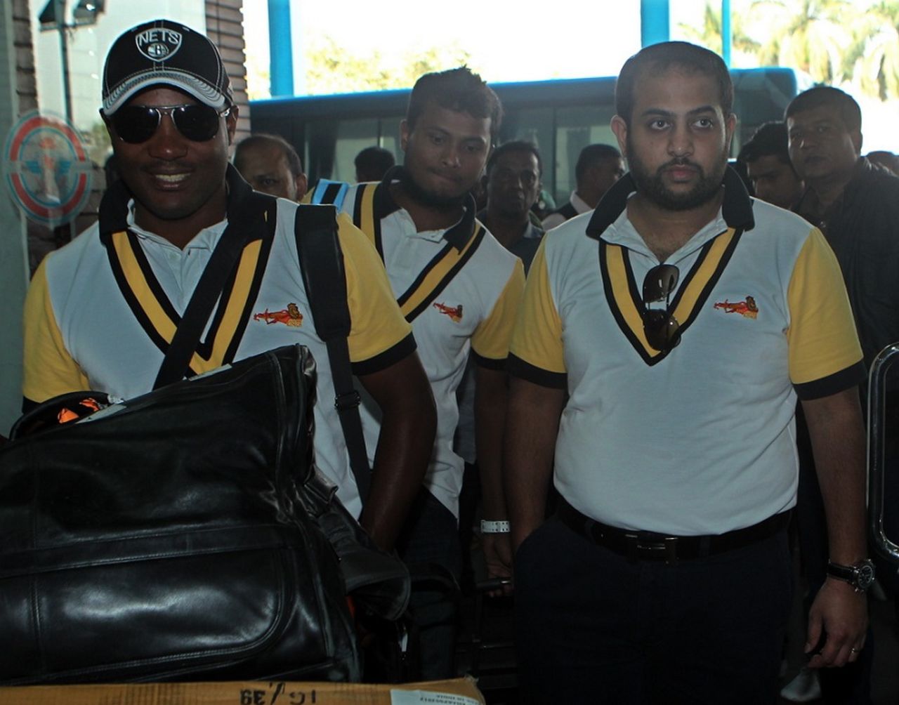 Brian Lara, Chittagong Kings' brand ambassador, walks out of the Jessore airport with the team, Khulna, January 20, 2013