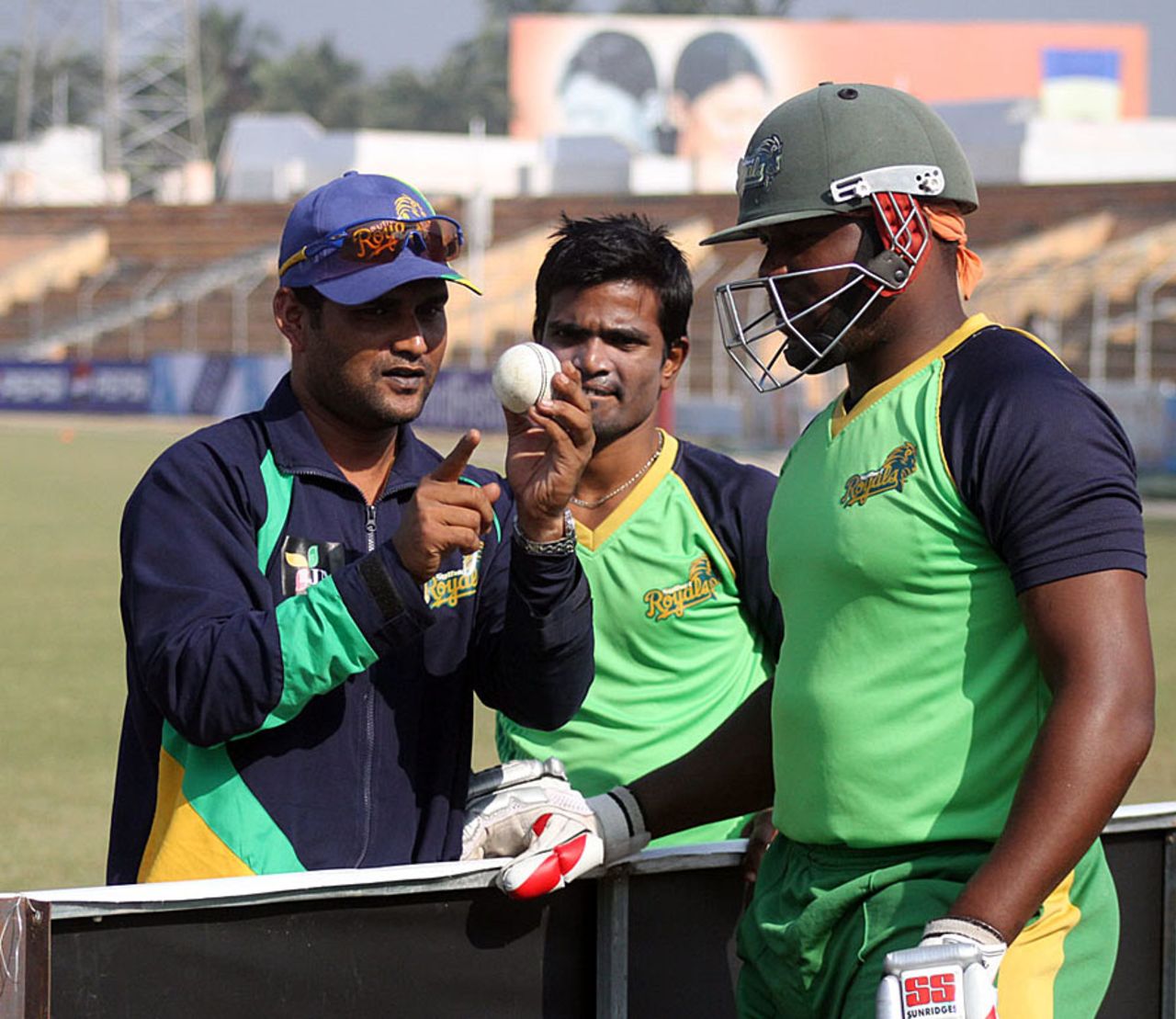 Sylhet Royals coach Mohammad Salahuddin provides tips to Hamilton Masakadza, Khulna, January 22, 2013