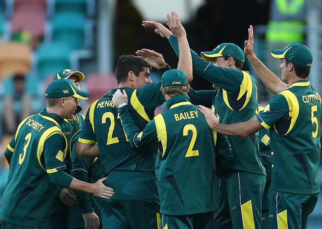 Moises Henriques is congratulated by team-mates after a wicket, Australia v Sri Lanka, 5th ODI, Hobart, January 23, 2013