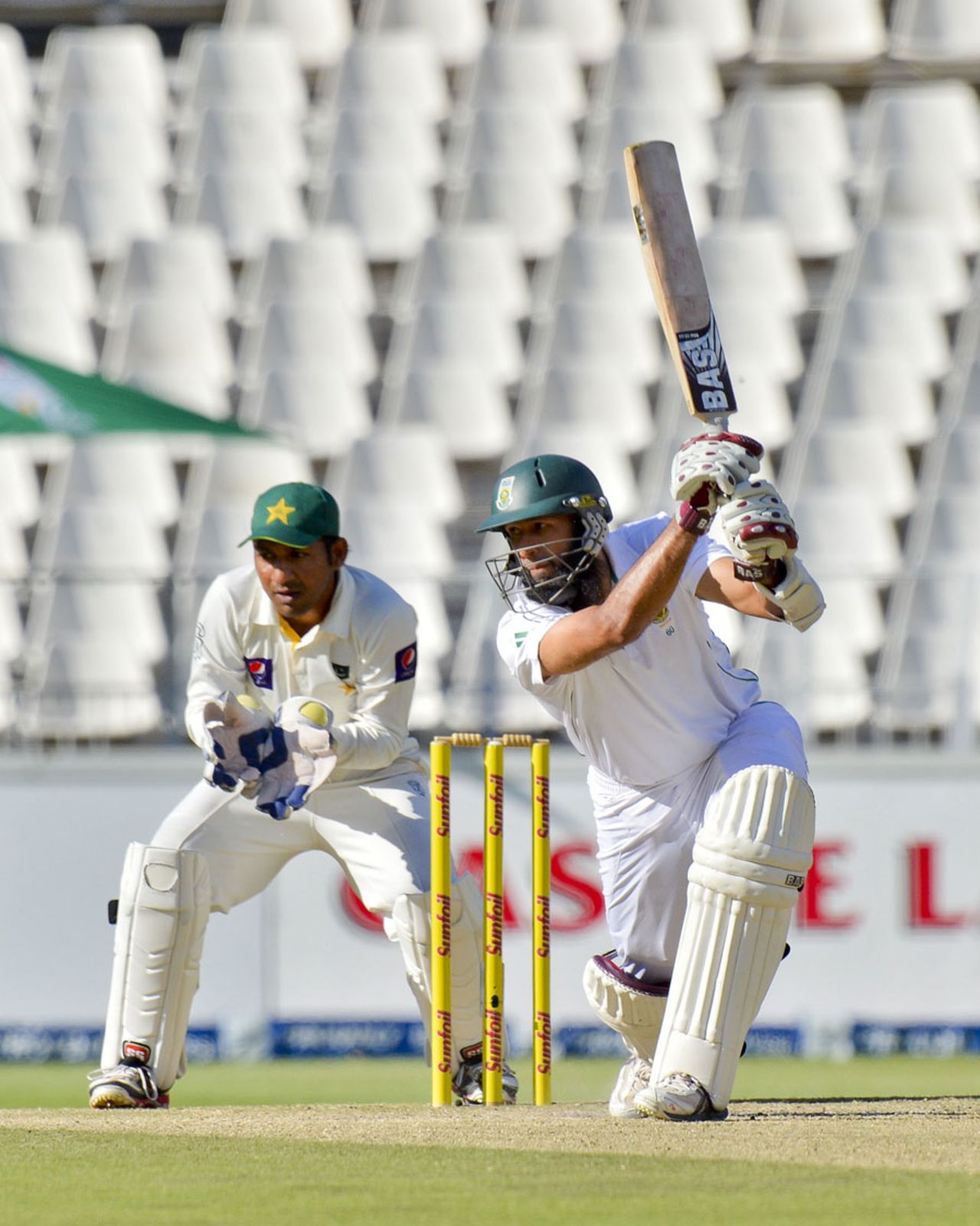 Hashim Amla drives on his way to a fifty, South Africa v Pakistan, 1st Test, Johannesburg, 2nd day, February 2, 2013