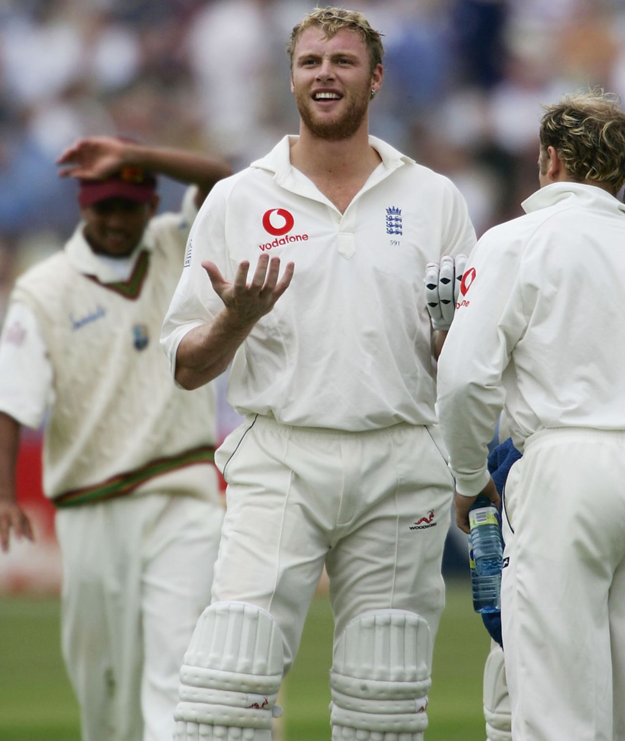 Andrew Flintoff is amused by his father's unsuccessful attempt to catch his six in the stands, England v West Indies, 2nd Test, 2nd day, July 30, 2004