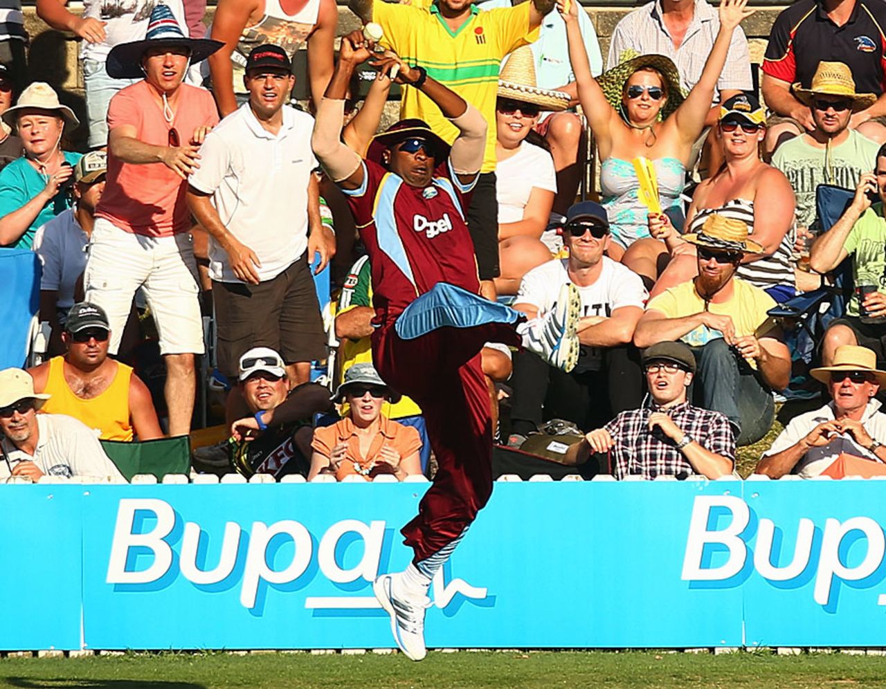 Kieron Pollard takes another brilliant catch at the boundary to dismiss George Bailey, Australia v West Indies, 3rd ODI, Canberra, February 6, 2013