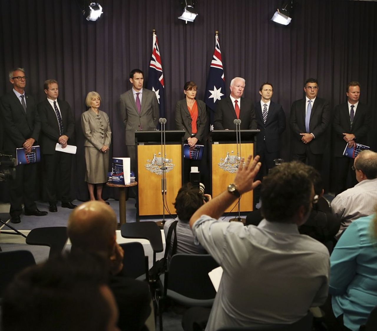 James Sutherland, and other sports and government leaders, at a press conference where some of the findings of the Australian Crime Commission's year-long investigation into sport were revealed, Canberra, February 7, 2013