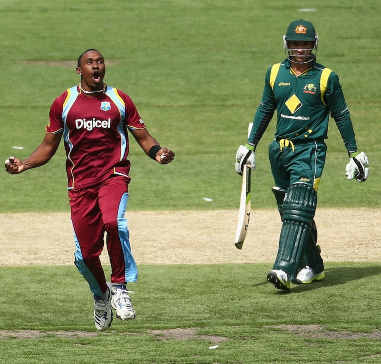 Dwayne Bravo is delighted after removing Phil Hughes, Australia v West Indies, 5th ODI, Melbourne, February 10, 2013
