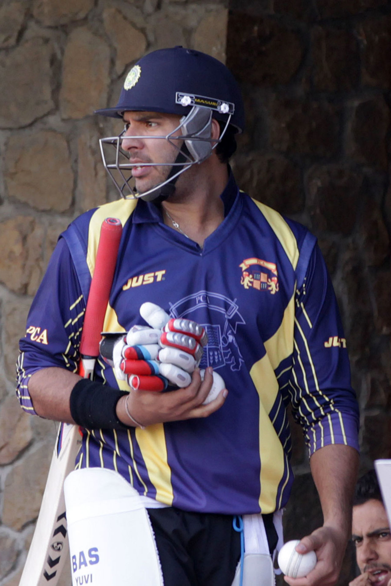 Yuvraj Singh pads up to bat during the Punjab-Haryana match, Vijay Hazare Trophy, Dharamsala, February 13 2013