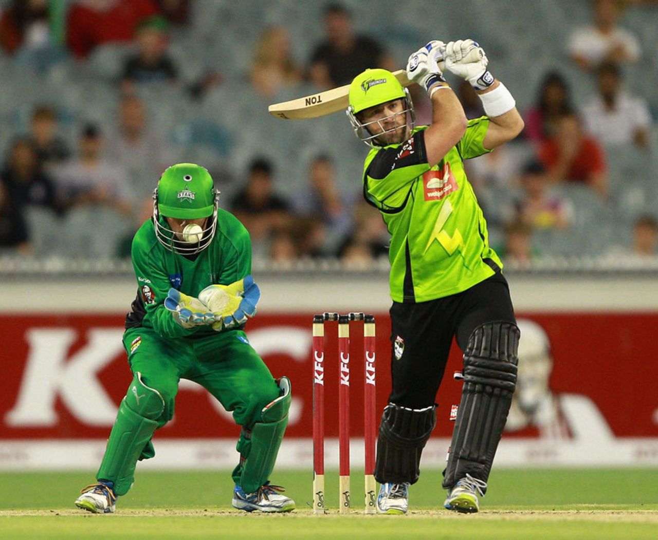 The ball lodges in Rob Quiney's helmet grill after Matt Prior's swing and miss, Melbourne Stars v Sydney Thunder, Big Bash League, January 8, 2013