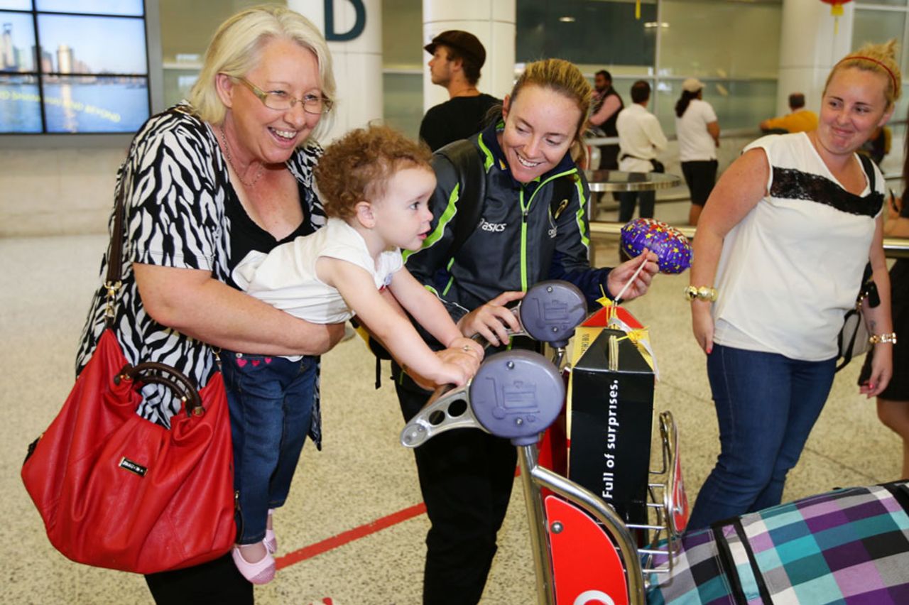 Australia's Sarah Coyte enjoying time with her family upon her arrival from the Women's World Cup, ICC Women's World Cup 2013, Sydney, February 21, 2013