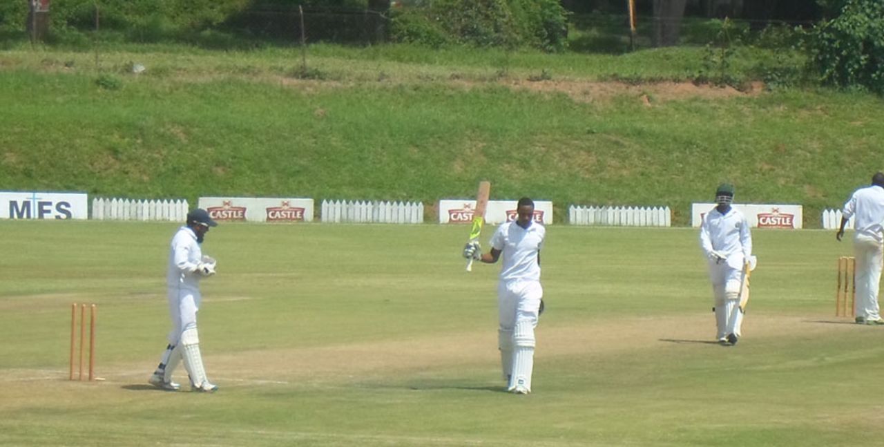 Timycen Maruma acknowledges the crowd after getting to a hundred, Mountaineers v Matabeleland Tuskers, Logan Cup, Mutare Sports Club, February 21, 2013