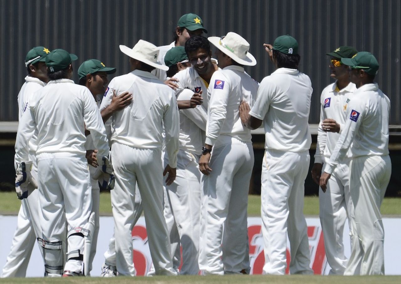 Ehsan Adil is congratulated on his first Test wicket, South Africa v Pakistan, 3rd Test, Centurion, 1st day, February 22, 2013