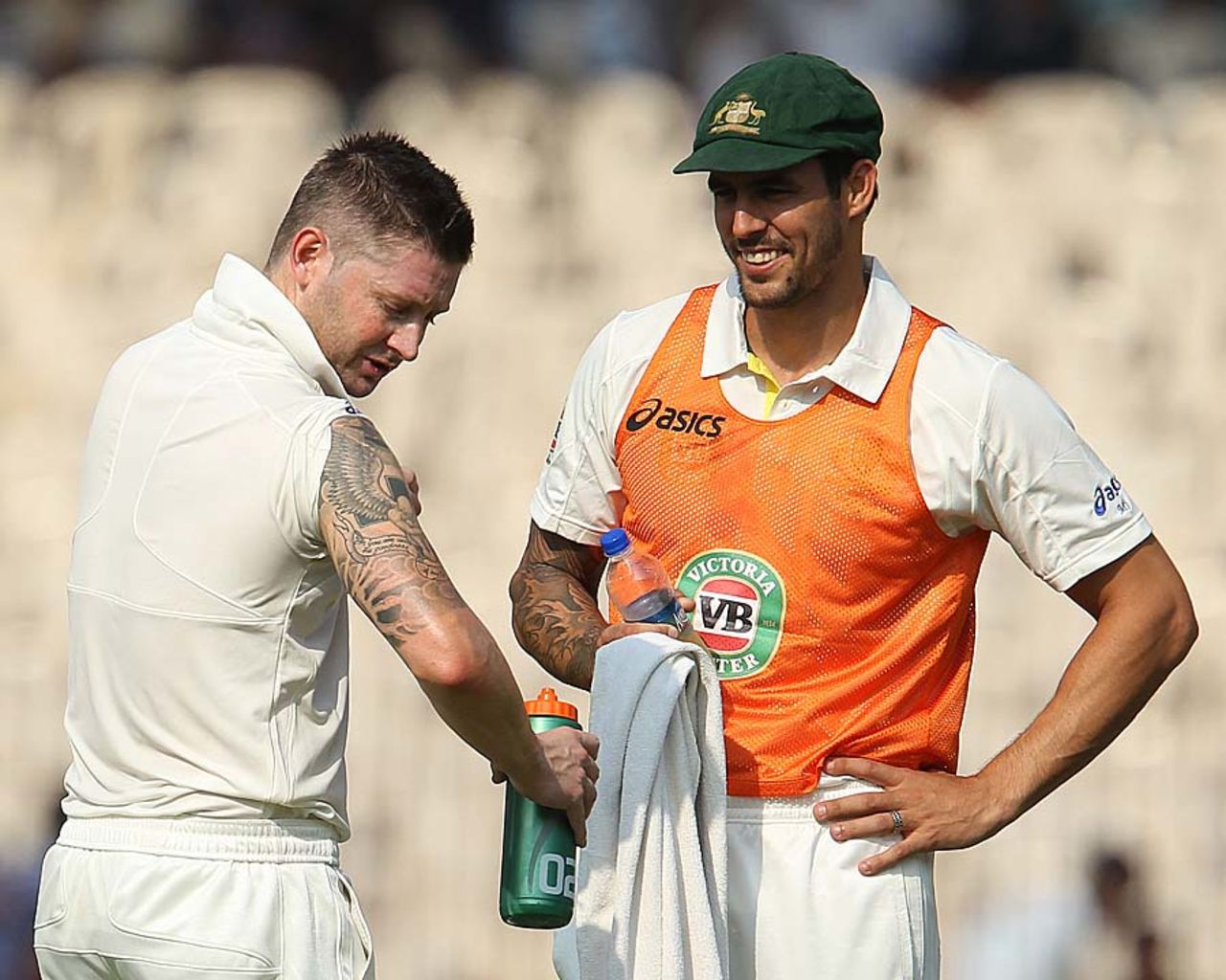Michael Clarke checks his arm during a break, India v Australia, 1st Test, Chennai, 1st day, February 22, 2013