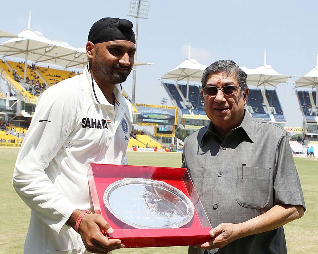 Harbhajan Singh receives a memento from N Srinivasan on playing his 100th Test, India v Australia, 1st Test, Chennai, 1st day, February 22, 2013