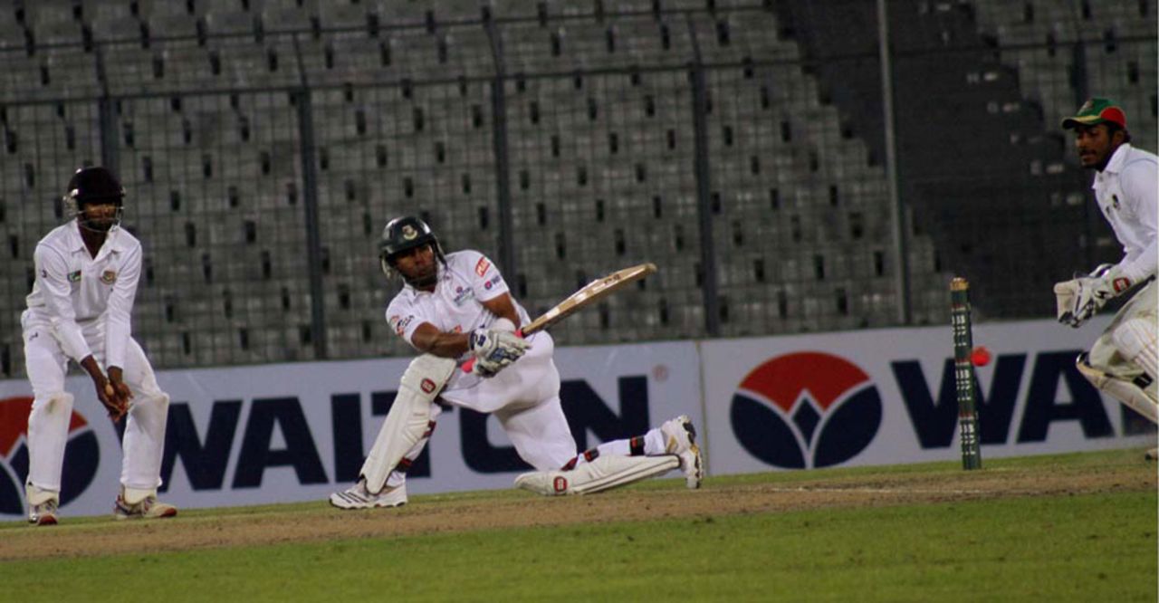 Central Zone's Raqibul Hasan sweeps to the onside, Central Zone v North Zone, BCL final, Mirpur, 1st Day, February 22, 2013