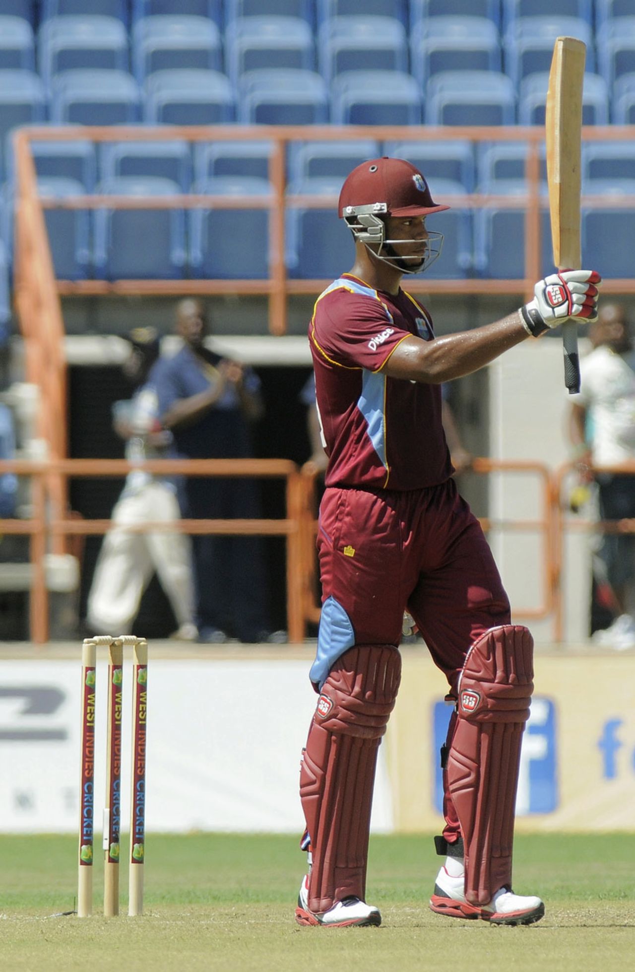 Kieran Powell raises his bat to acknowledge the crowd after getting to his 50, West Indies v Zimbabwe, 1st ODI, Grenada, February 22, 2013