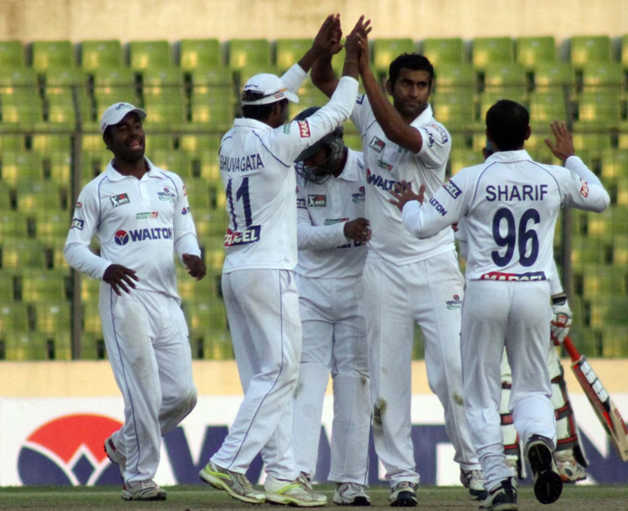 Central Zone's Mosharraf Hossain celebrates a wicket with his team-mates, Central Zone v North Zone, BCL final, Mirpur, 2nd day, February 23, 2013