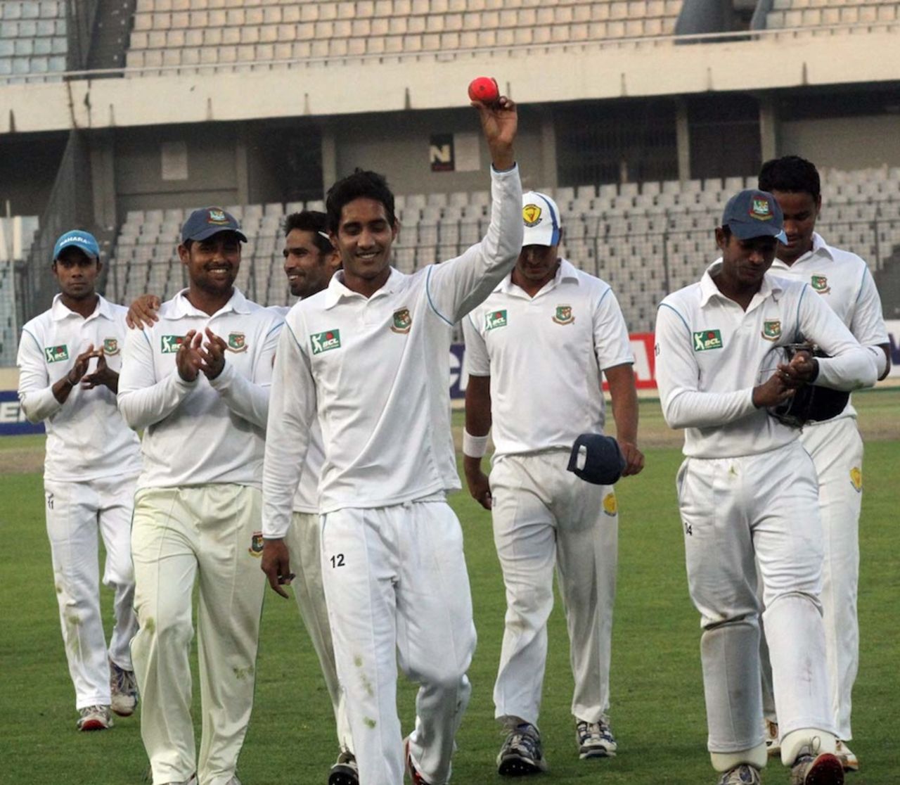 Sanjamul Islam leads the team back after taking eight wickets, Central Zone v North Zone, BCL final, Mirpur, 3rd day, February 24, 2013