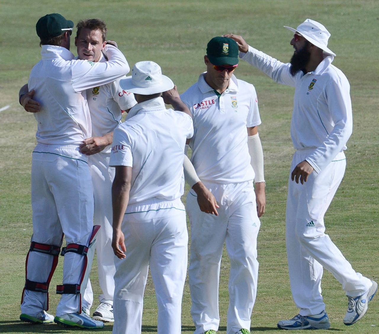 Dale Steyn celebrates with his team-mates , South Africa v Pakistan, 3rd Test, Centurion, 3rd day, February 24, 2013