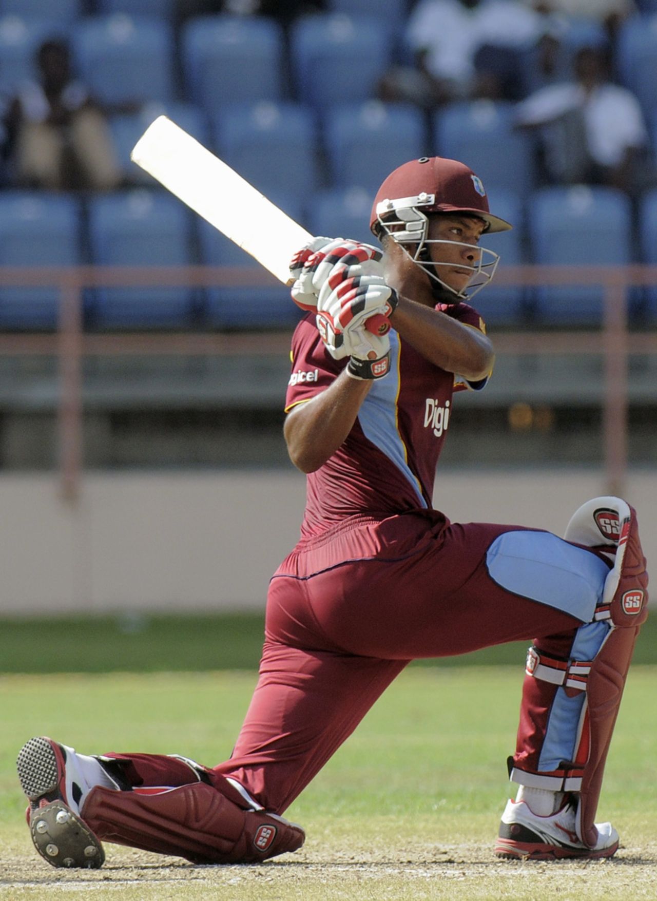 Kieran Powell sweeps during his 42, West Indies v Zimbabwe, 3rd ODI, Grenada, February 26, 2013
