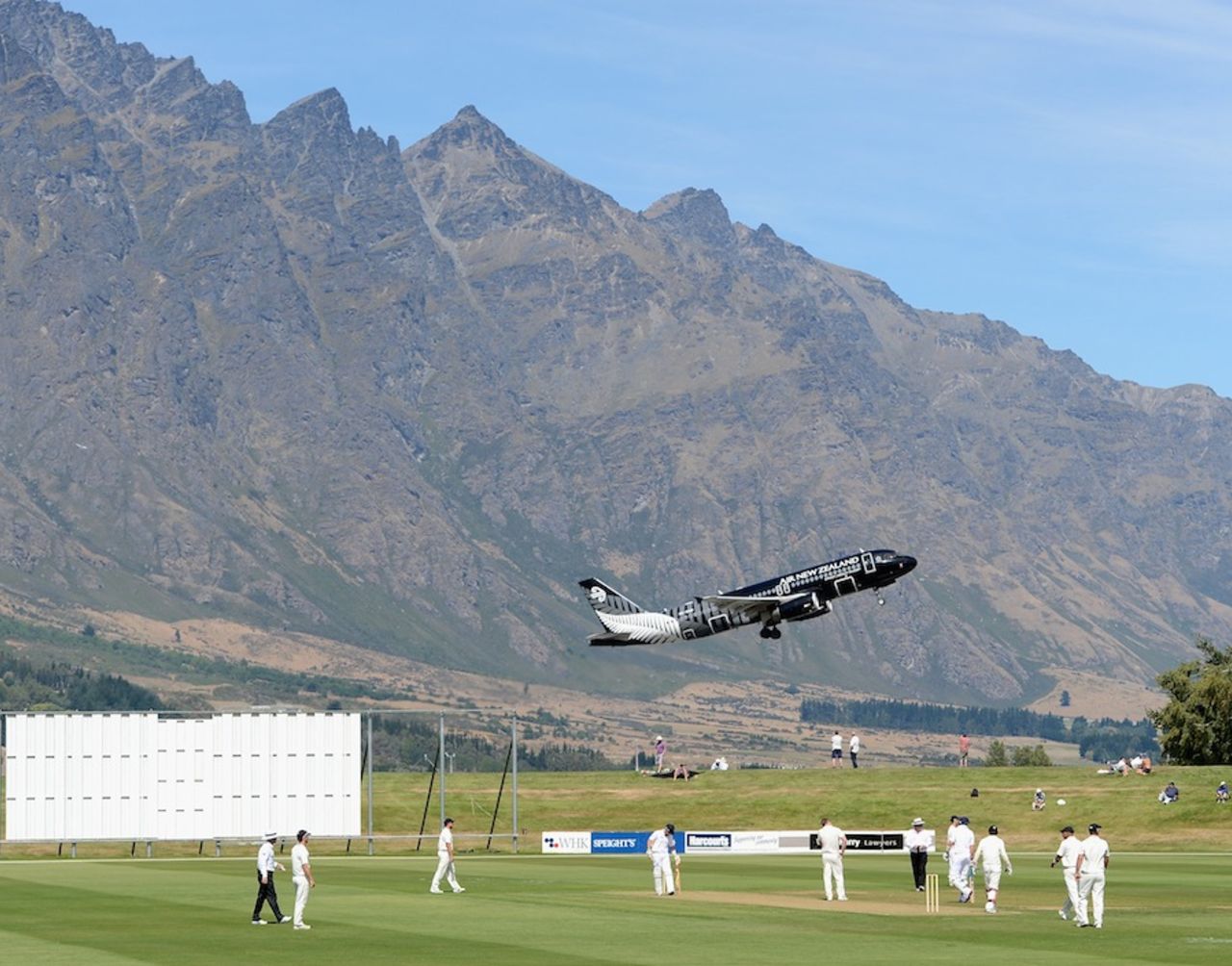 A plane takes off from the neighbouring airport, New Zealand XI v England XI, Tour match, Queenstown, 1st day, February 27, 2013