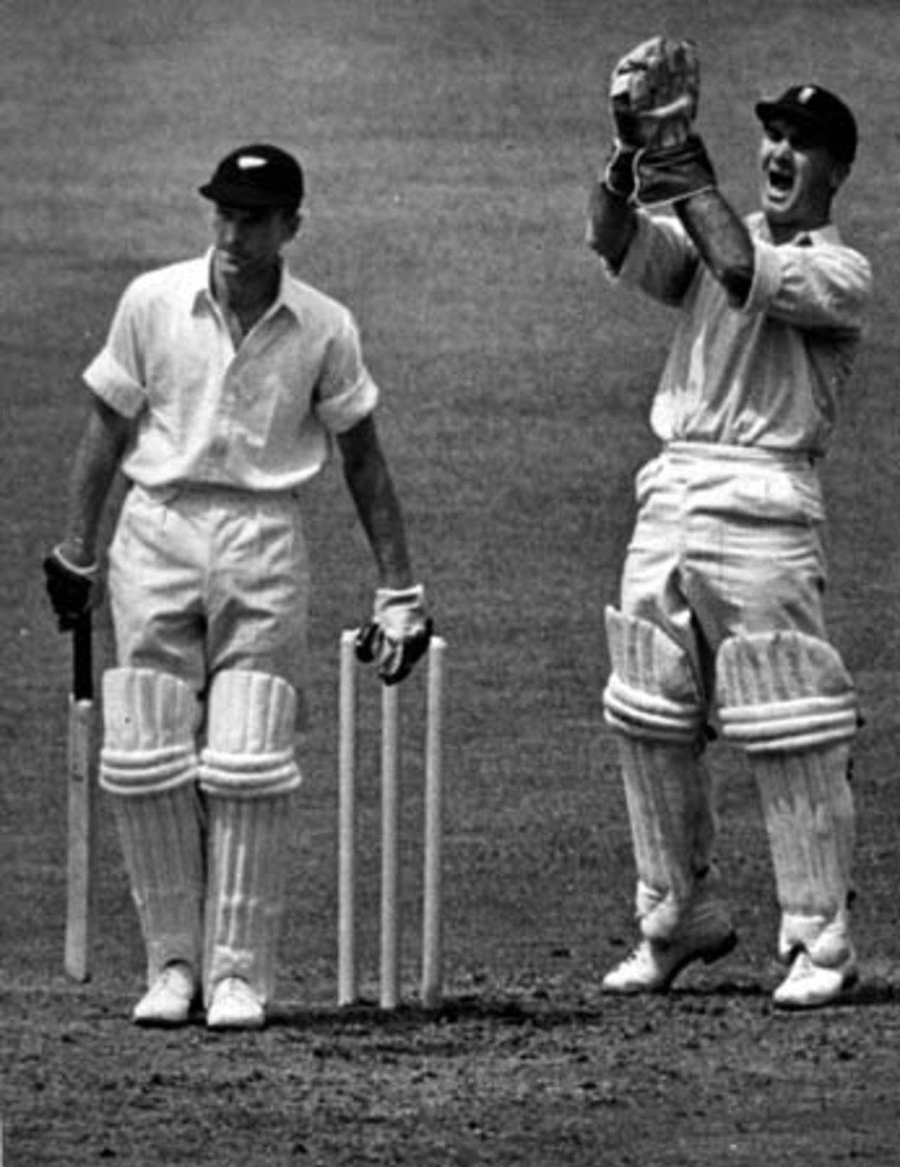 England wicket-keeper Godfrey Evans celebrates catching New Zealand batsman Bert Sutcliffe off the bowling of left arm orthodox spinner Jack Young for 32 in his first innings. 1st Test: England v New Zealand at Headingley, Leeds, 1949.