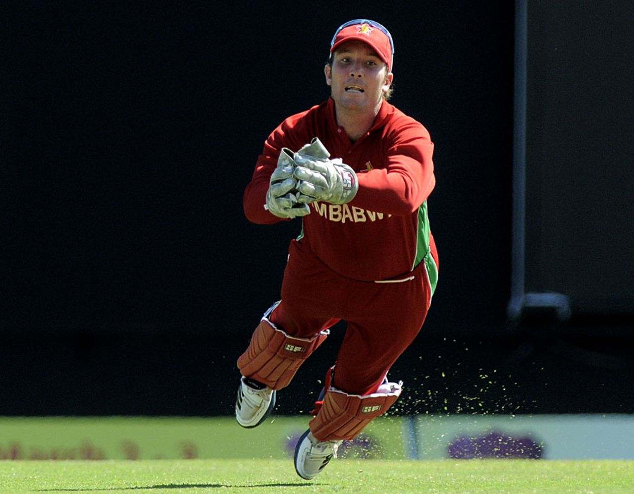 Brendan Taylor takes a sharp catch running backwards, West Indies v Zimbabwe, 2nd T20I, Antigua, March 3, 2013