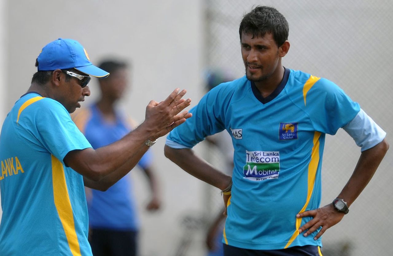Chaminda Vaas talks to fast bowler Suranga Lakmal during a practice session in Galle before the start of the Test series against Bangladesh, Bangladesh tour to Sri Lanka, Galle, March 6, 2013