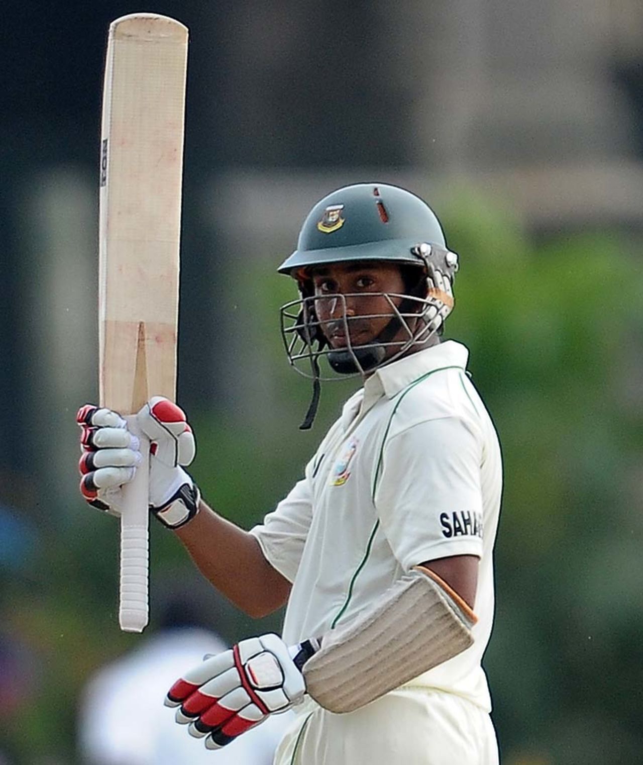 Mohammad Ashraful raises his bat after scoring a fifty, Sri Lanka v Bangladesh, 1st Test, Galle, 2nd day, March 9, 2013