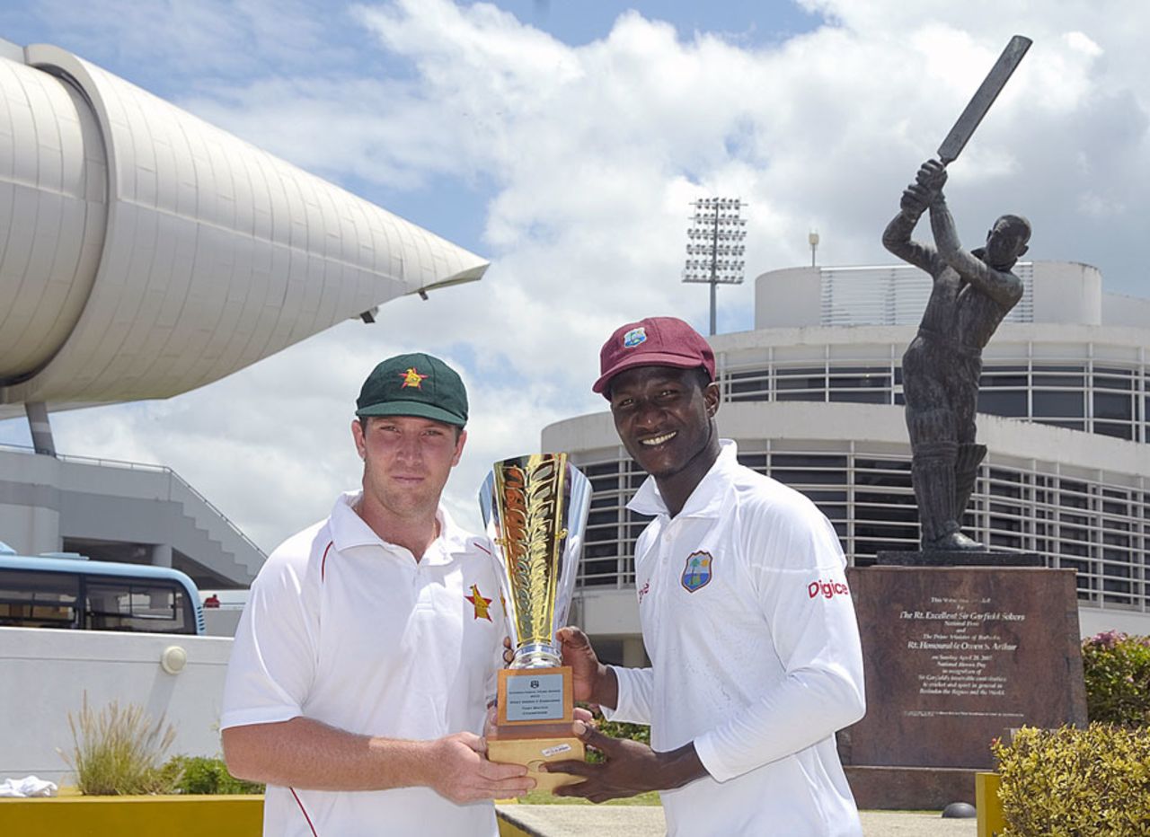 Brendan Taylor and Darren Sammy with the Test series trophy, Barbados, March 11, 2013