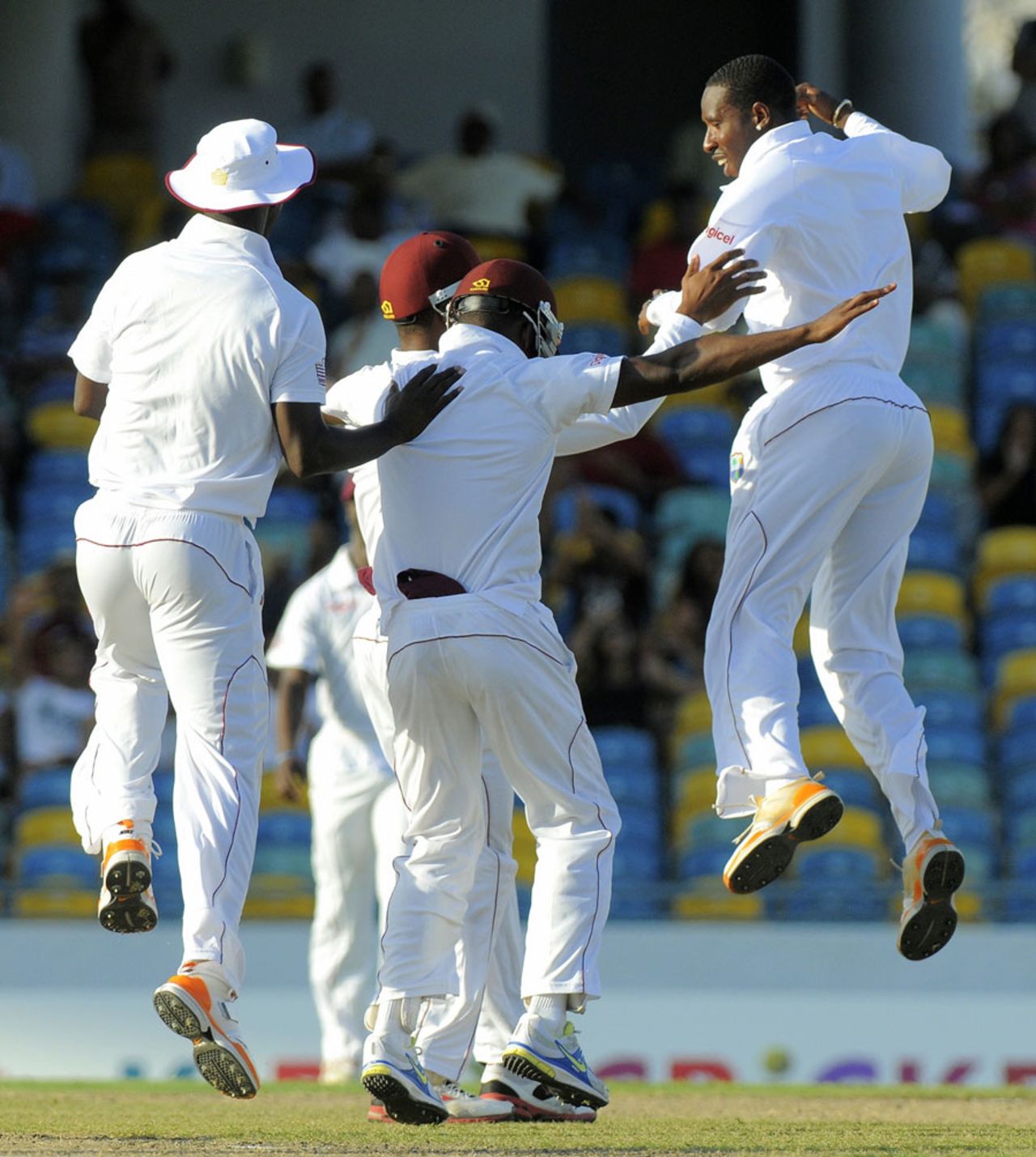 Shane Shillingford celebrates after taking a wicket, 1st Test, 2nd day, March 13, 2013