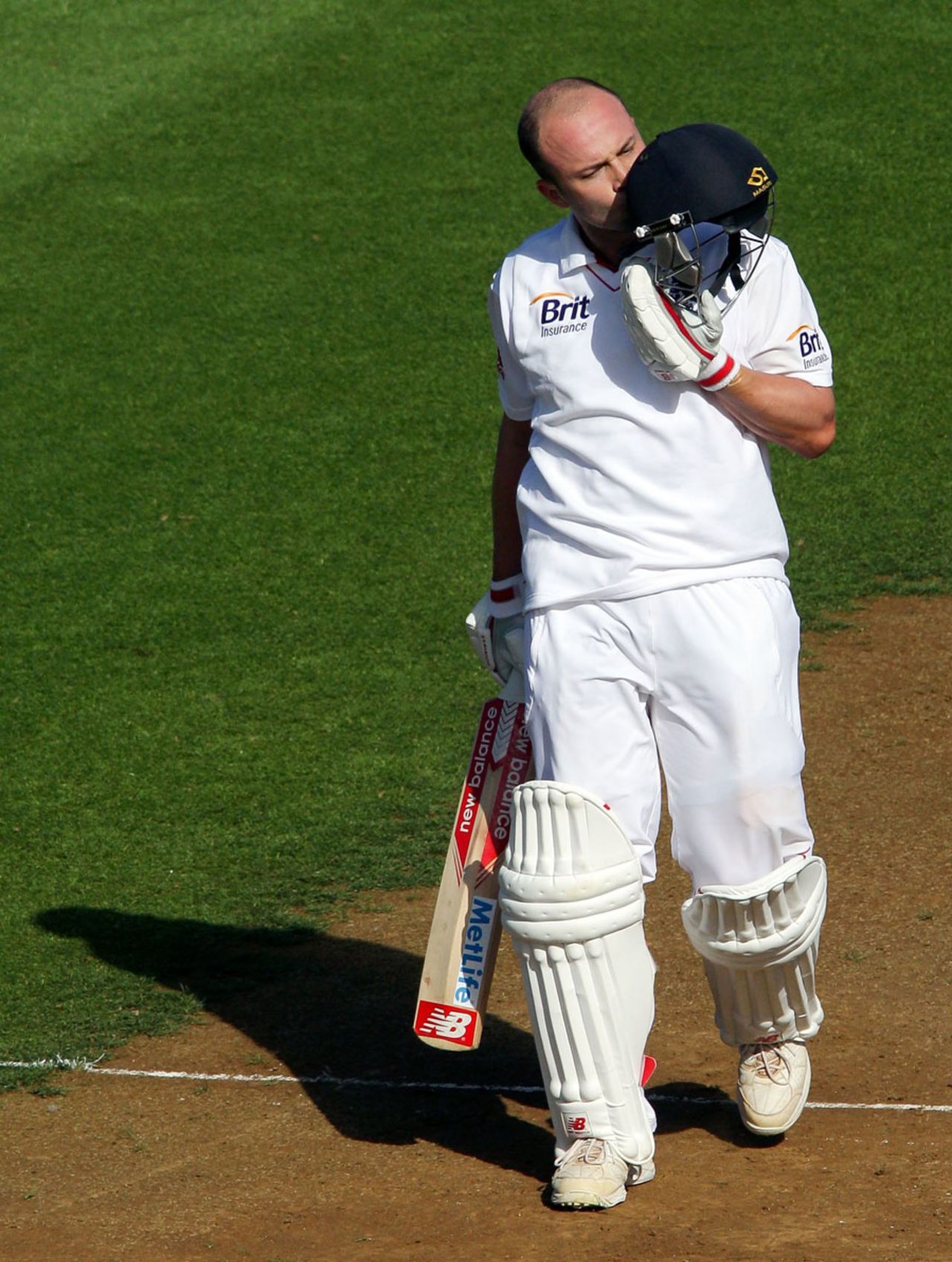 Jonathan Trott kisses his helmet after reaching his century, New Zealand v England, 2nd Test, Wellington, 1st day, March 14, 2013