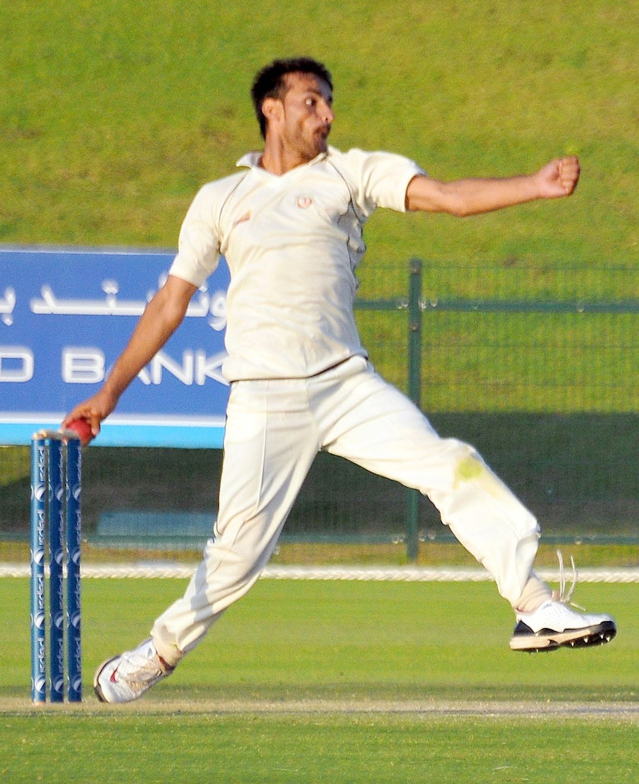Izatullah Dawlatzai bowls during his five-wicket haul in the second innings, Afghanistan v Scotland, Intercontinental Cup, Abu Dhabi, 2nd day, March 13, 2013
