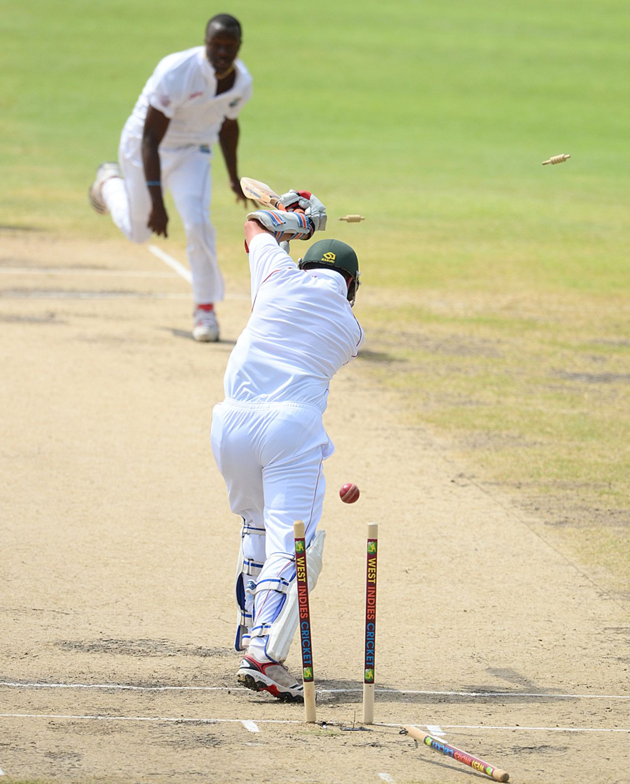 Ray Price is bowled by Kemar Roach, West Indies v Zimbabwe, 1st Test, Barbados, 3rd day, March 14, 2013