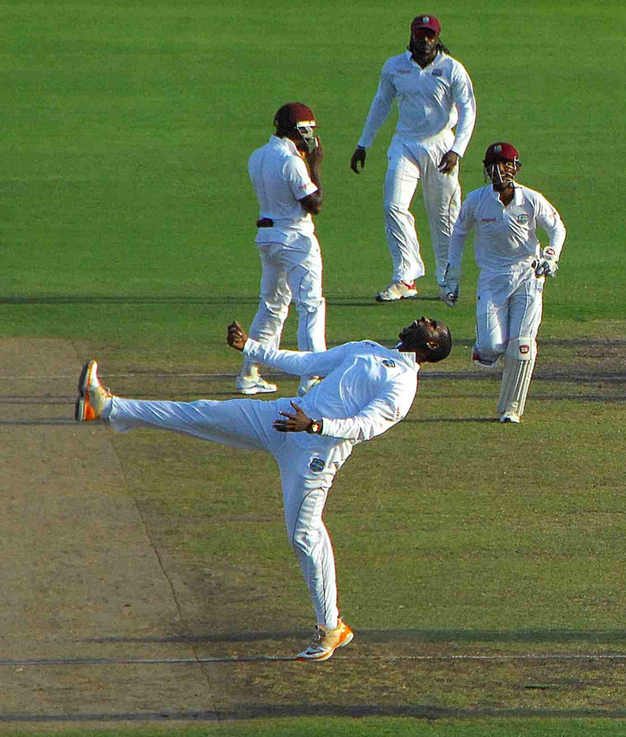 Shane Shillingford is over the moon after taking a wicket, West Indies v Zimbabwe, 1st Test, Barbados, 2nd day, March 13, 2013