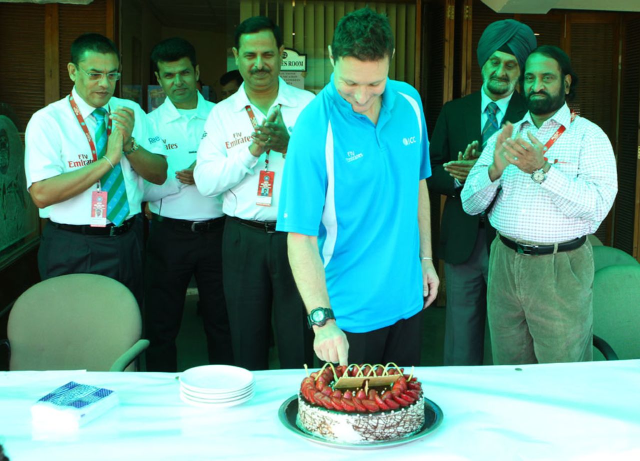 Richard Kettleborough cuts his birthday cake as he celebrates his 40th birthday at Mohali, India v Australia, 3rd Test, Mohali, 2nd day, March 15, 2013
