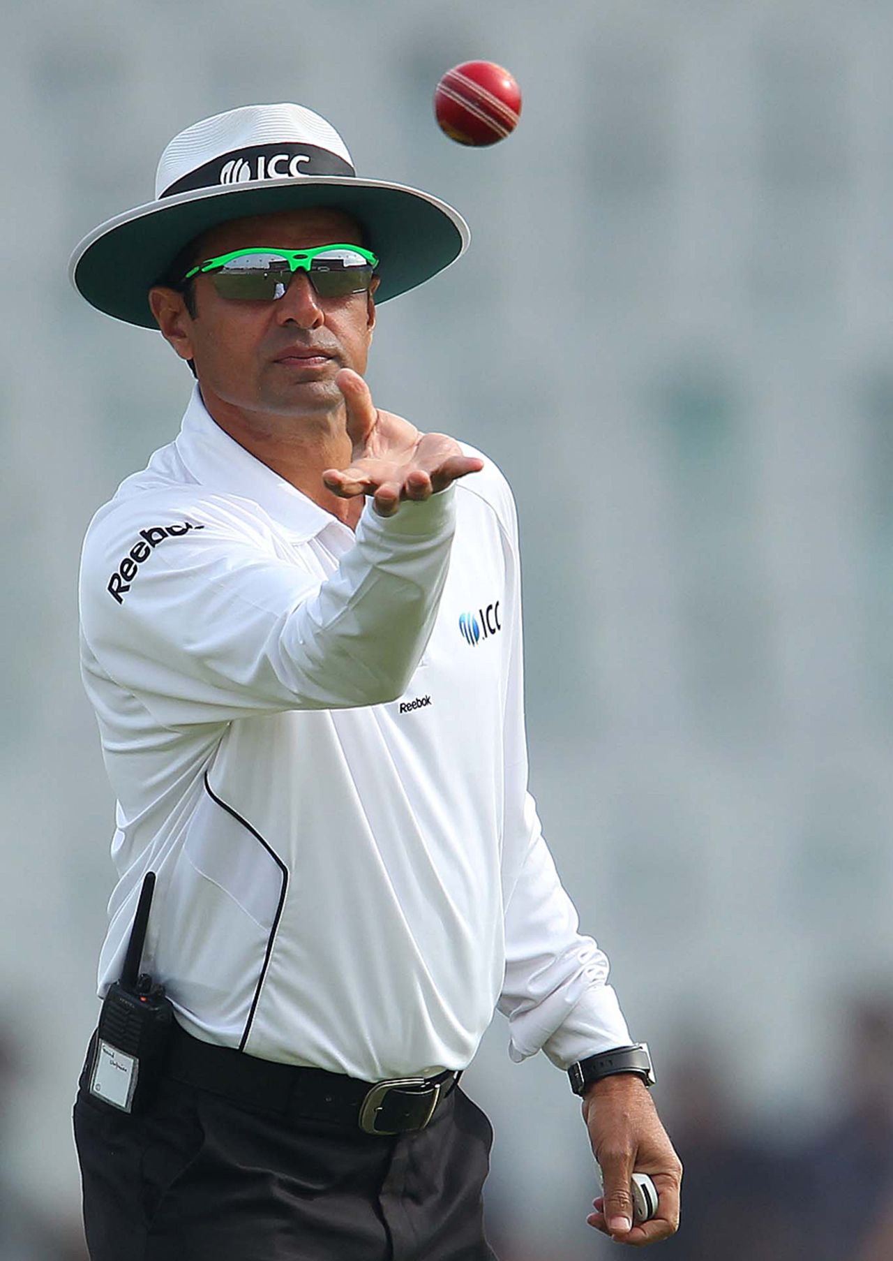 Umpire Aleem Dar takes the new ball, India v Australia, 3rd Test, Mohali, 3rd day, March 16, 2013