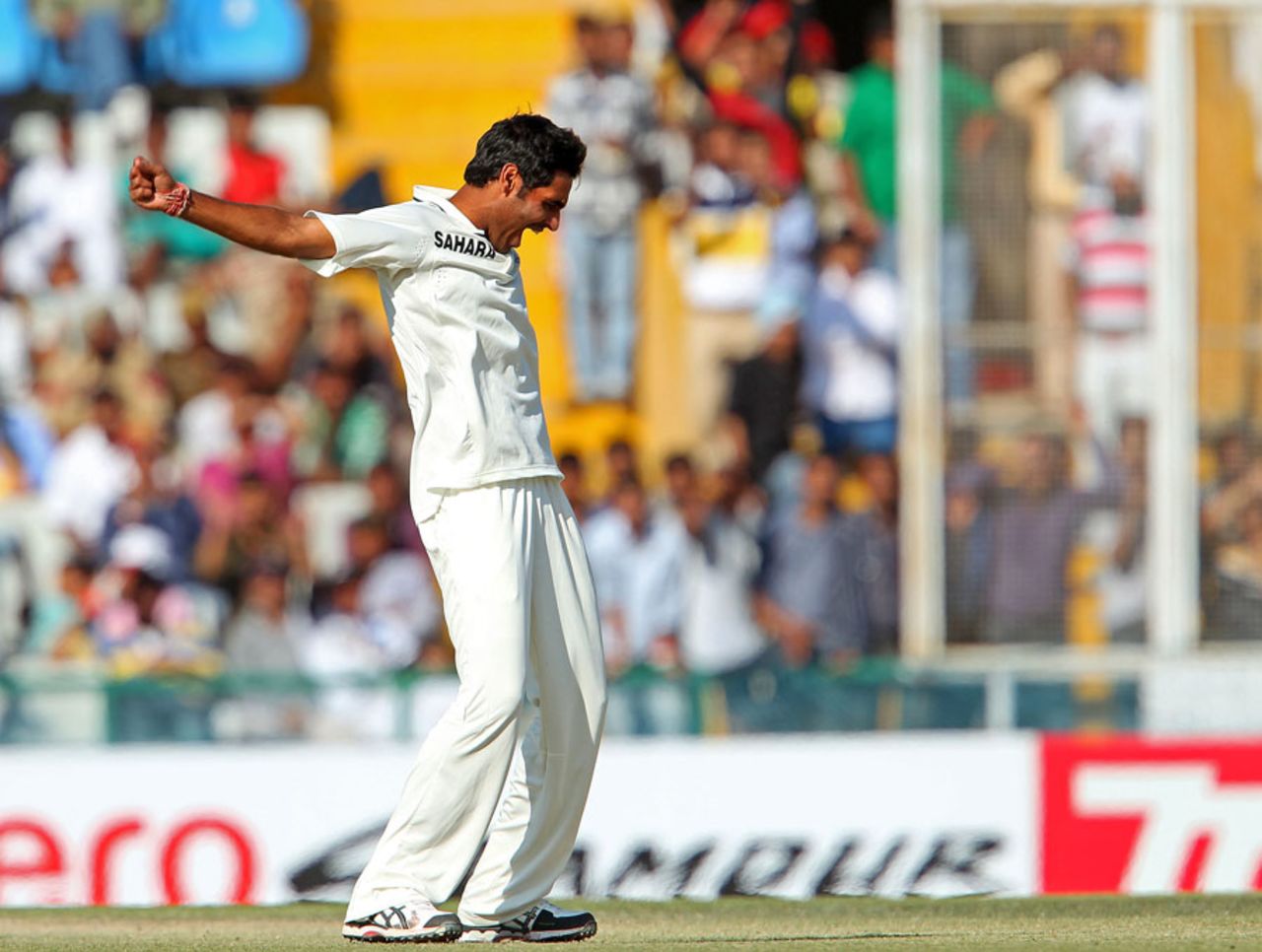 Bhuvneshwar Kumar is ecstatic after striking early, India v Australia, 3rd Test, Mohali, 4th day, March 17, 2013