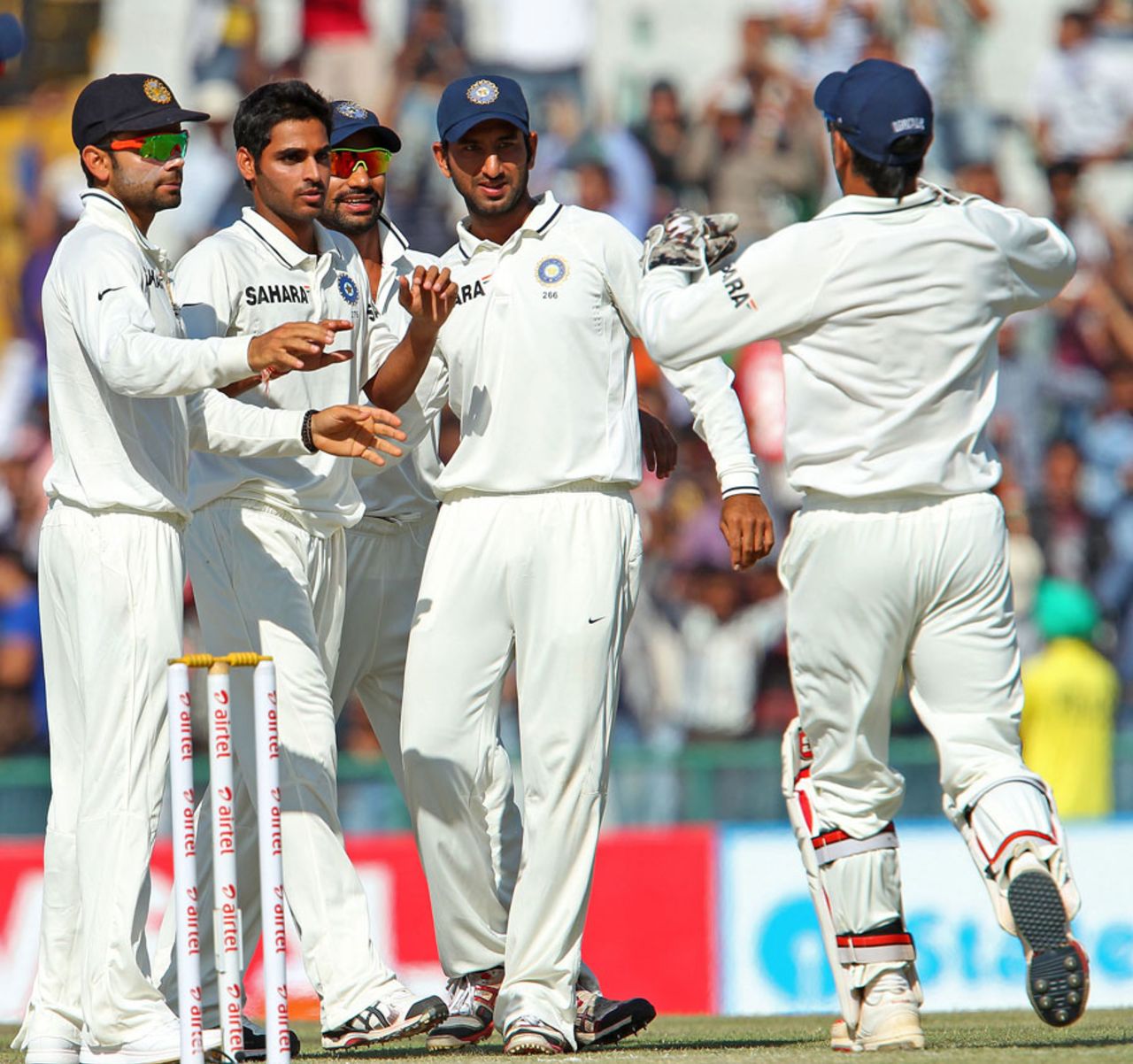 India get together after a wicket, India v Australia, 3rd Test, Mohali, 4th day, March 17, 2013